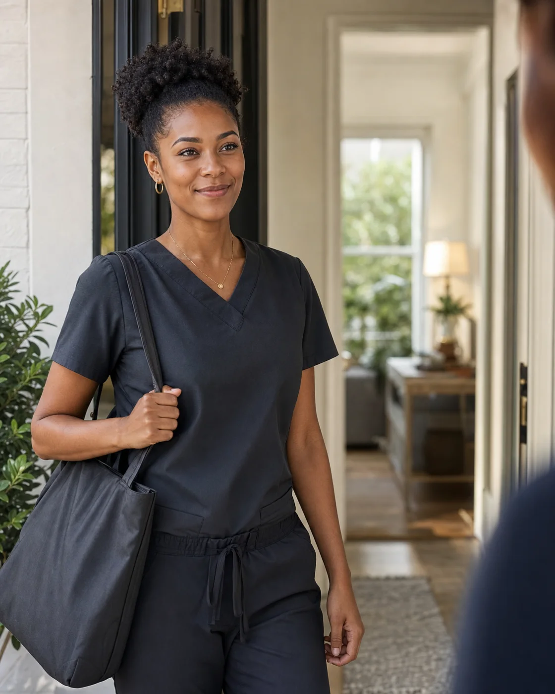 A professional caregiver arriving at a home